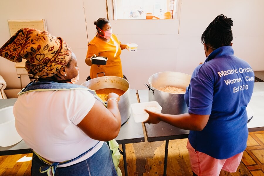 Ladies preparing food at Kwadwesi soup kitchen